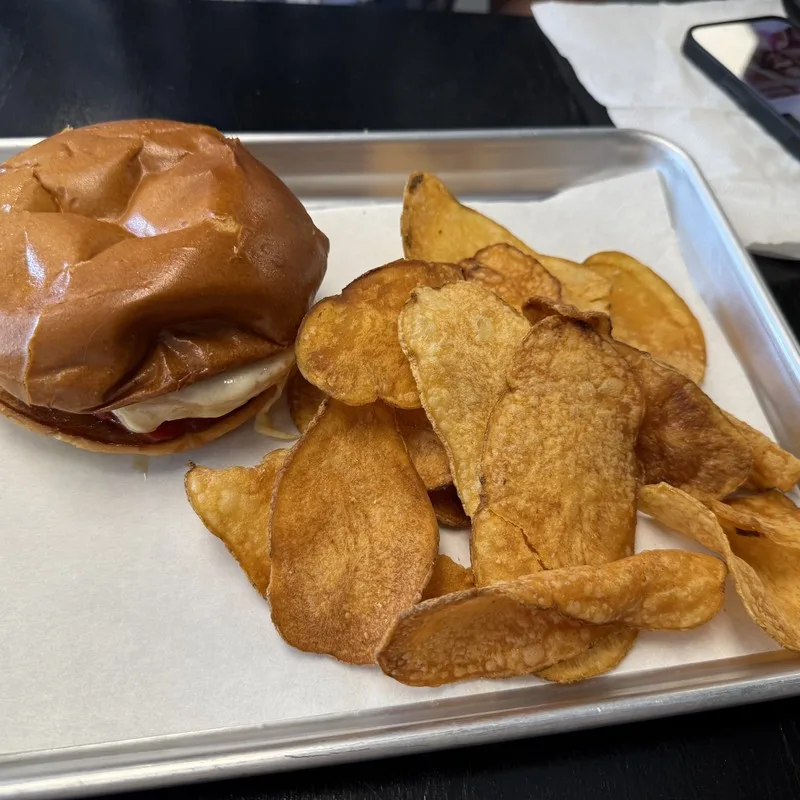 Burger Delishh half-pound burger served with house-cut chips